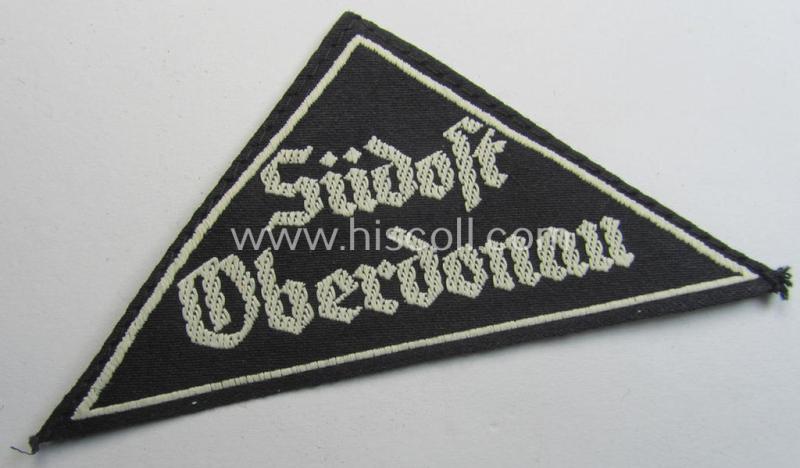 Attractive, 'HJ' ie. 'BDM' ('Bund Deutscher Mädel') district-triangle (ie. 'Gebietsdreieck') entitled: 'Südost Oberdonau' (being a 'virtually mint' example that retains its period-attached, paper-based so-called: 'RzM'-etiket