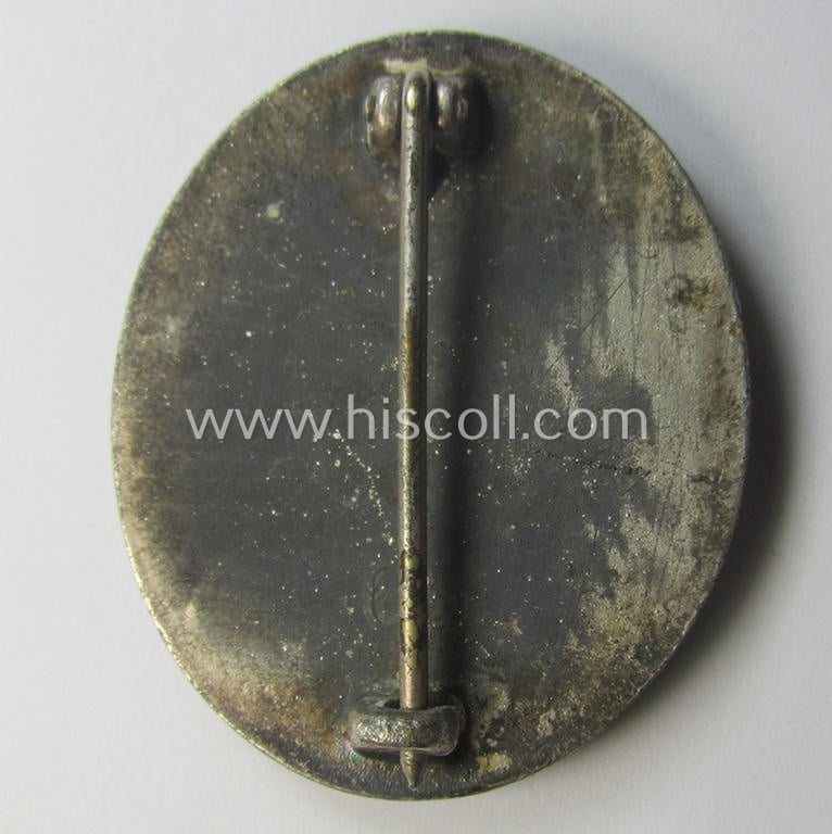 Silver-class wound-badge (or: 'Verwundeten-Abzeichen in Silber') being a maker- (ie. '65'-) marked example as was produced by the 'Hersteller' ie. maker: 'Klein u. Quenzer'