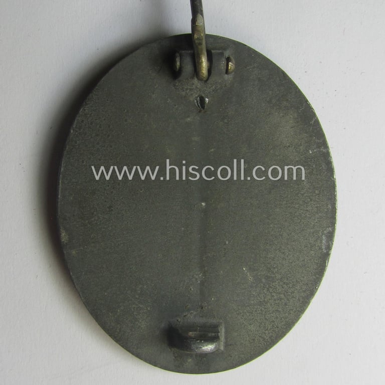 'Verwundeten-Abzeichen in Silber' (ie. silver-class wound-badge) being a maker- (ie. '4'-) marked example as was produced by the: 'Steinhauer u. Lück'-company