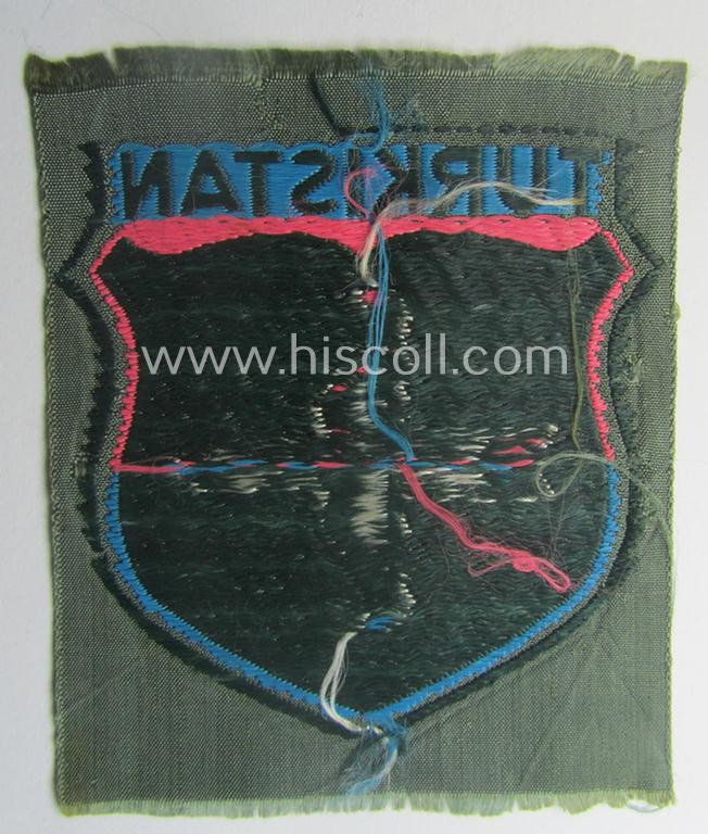 'BeVo'-type armshield entitled: 'Turkistan' (being of the scarcely encountered third and/or final pattern!) that was intended for a volunteer who served within the: 'Deutsche Wehrmacht' ie. within the: 'Turkistanisches Legion'