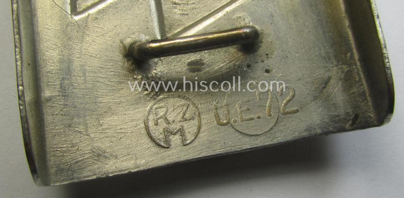 Complete(!) DJ (ie. 'Deutsches Jungvolk') silver-coloured- (ie. typical nickle-chromed) belt-buckle (ie. 'Koppelschloss') being a maker- (ie. 'RzM U.E. 72'-) marked example that comes mounted onto its (nicely marked), leather-based belt