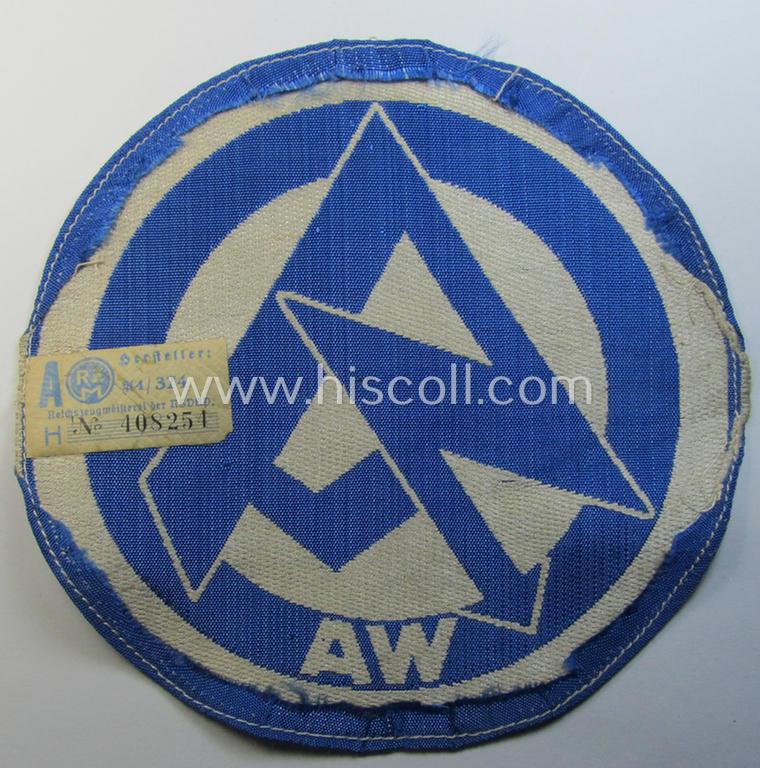 Attractive - and scarcely encountered! - SA (ie. 'Sturmabteilungen'), 'BeVo'-woven sport-shirt insignia still showing its period-attached 'RzM'-etiket as was intended for an SA-member who served within the: 'Gruppe Wartheland' (WA)