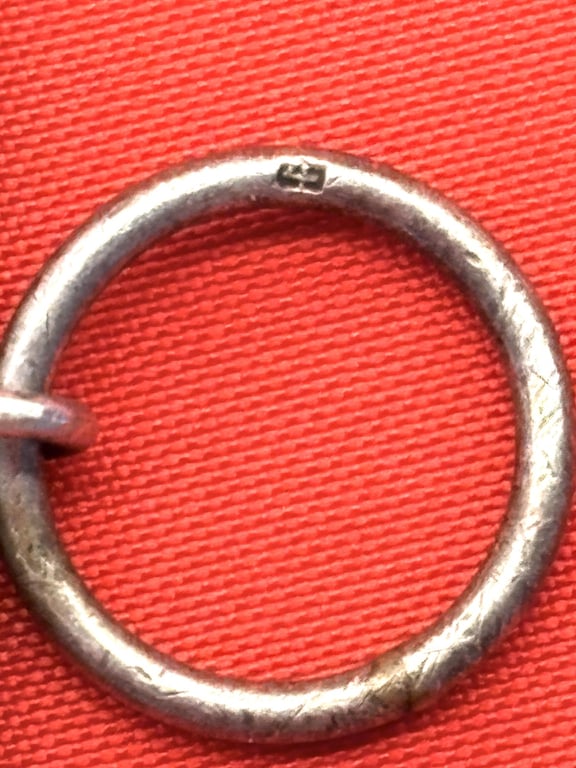RARE AUTHENTIC WWII IRON CROSS 2RD CLASS RING STAMPED 4, STEINHAUER & LUCK OF LUDENSCHHELD GERMANY.