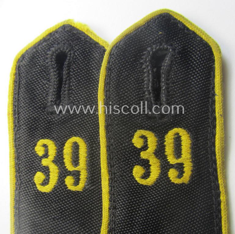 Pair of bright-yellow-piped, so-called: 'Nachrichten-HJ'- (ie. signals'-'HJ'-) shoulderstraps as was intended for usage by a: 'HJ-Junge' who served within the: 'Bann 39' (39 = 'Bann Düsseldorf' in the 'Gebiet West Düsseldorf')