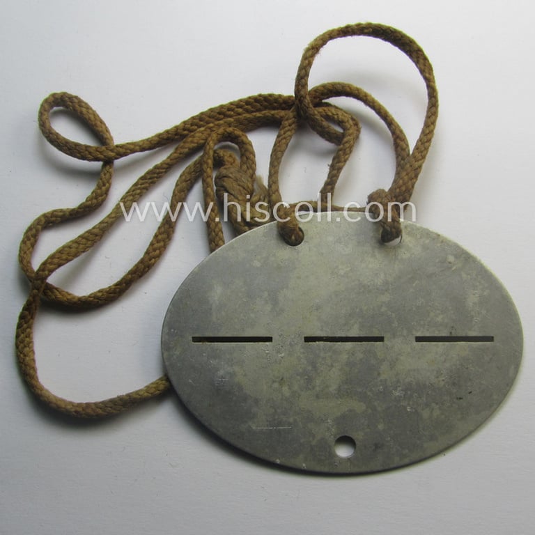 Aluminium-based, WH (Heeres) (ie. 'Infanterie'-related) ID-disc bearing the clearly stamped unit-designation that reads: 'Stb. II./J.R. 80' and that comes mounted onto its (period-attached) cord