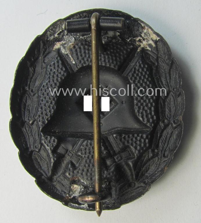 Attractive, early-pattern black-class wound-badge (ie.: 'Verwundeten Abzeichen in Schwarz') being a detailed so-called: 'Spanish Civil-War'-version that comes in a just moderately used- and/or worn, condition