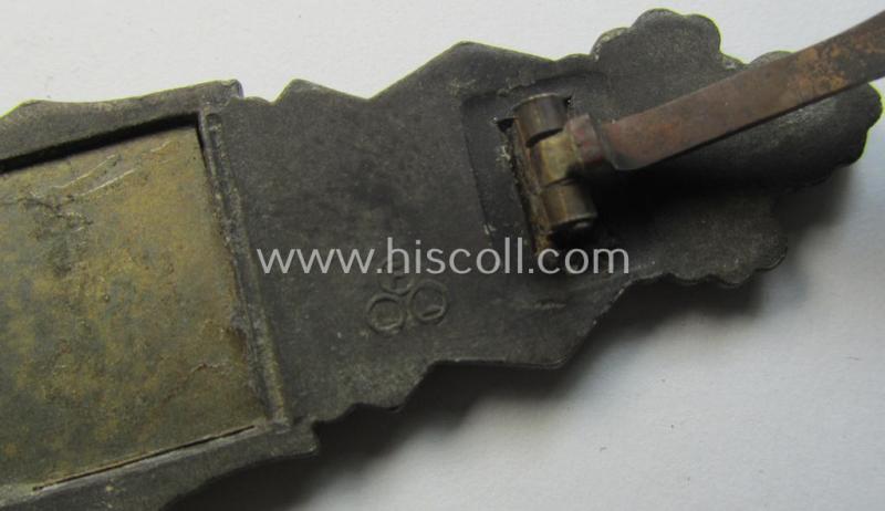 'Nahkampfspange in Bronze' (or: bronze-class close-combat clasp ie. CCC) being a maker- (ie. 'FLL'-) marked- and/or non-converse-shaped so-called: '3rd pattern'-specimen as was produced by the maker- (ie. 'Hersteller') 'Friedrich Linden'