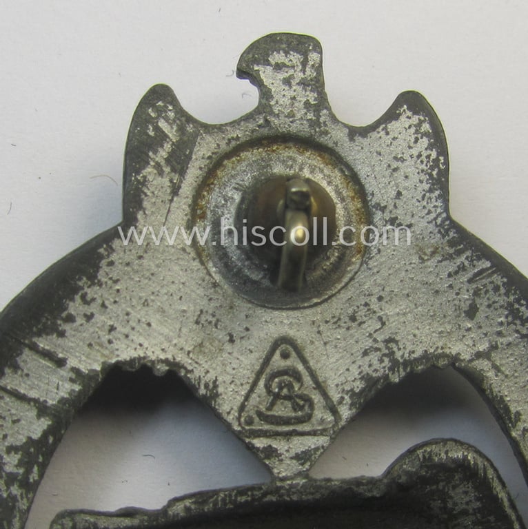 Incomplete 'Panzerkampfabzeichen in Silber' (or: silver-class panzer-assault badge or PAB) being a maker- (ie. 'AS' in a triangle-) marked- and/or typical zinc- (ie. 'Feinzink'-) based specimen as was procuced by a to date unknown maker
