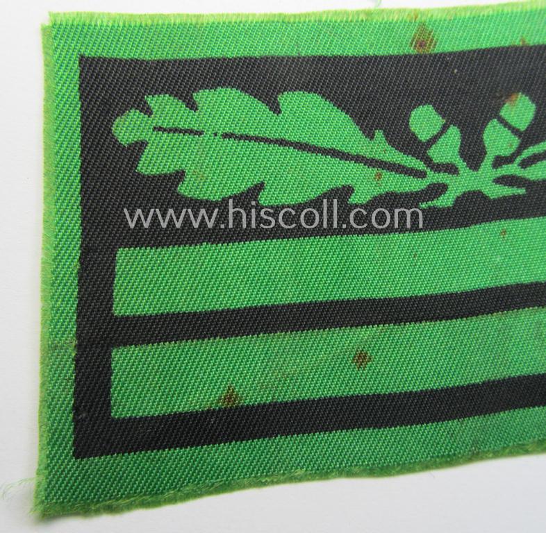 Attractive - clearly used albeit regrettably single! - officers'-pattern, WH (Heeres o. Waffen-SS) rank-insignia-bar (for usage on the camouflaged-uniforms) as used by an officer holding the rank of: 'Oberleutnant' (ie.: 'SS-Obersturmführer')