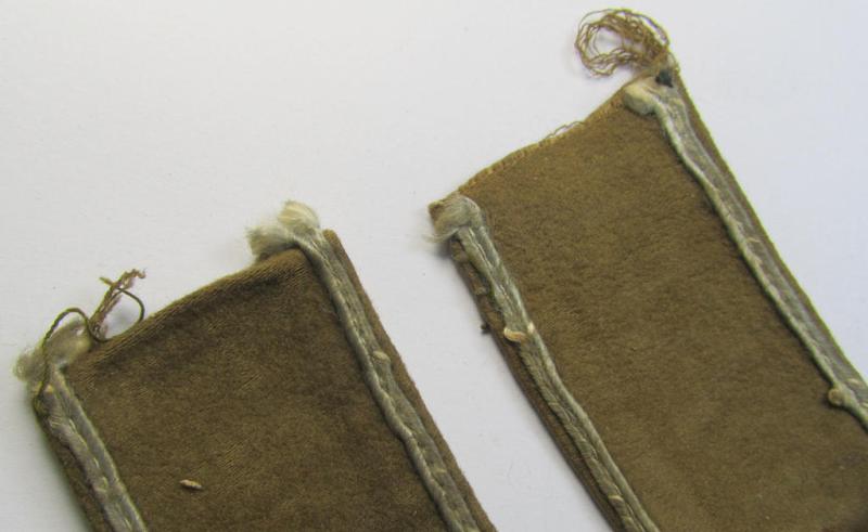 Attractive, WH (LW o. Heeres) cuff-title (ie. 'Ärmelstreifen') entitled: 'Afrika' (being a period-shortened- and woolen-based example that comes in a clearly issued- and/or worn condition)