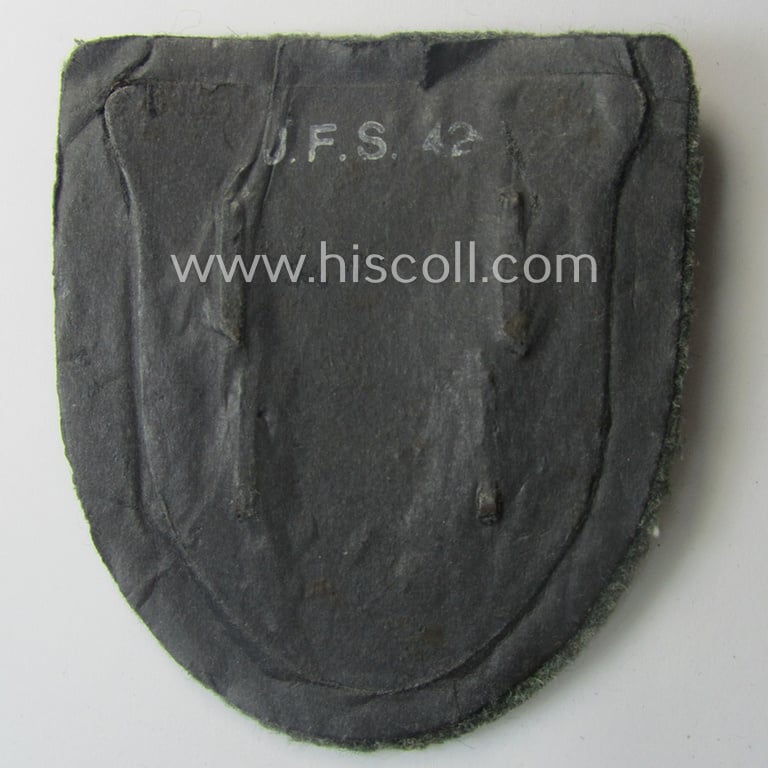 Stunning - and scarcely encountered! - WH (Heeres ie. Waffen-SS) 'Krim'-campaign-shield (as was produced by the maker: 'Josef Feix u. Söhne' ie. 'JFS') and that comes mounted onto its original field-grey-coloured- and/or woolen-based 'backing'
