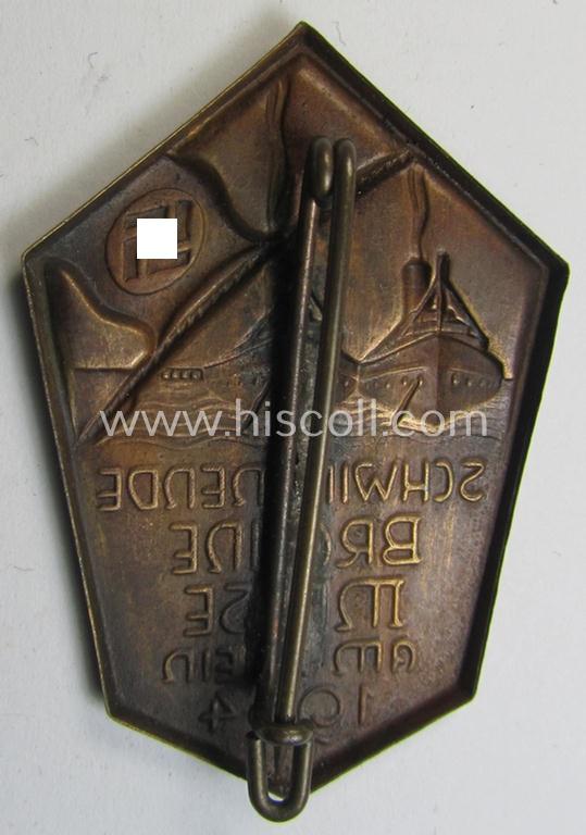 Commemorative - copper-based- and/or copper-coloured - N.S.D.A.P.-related 'tinnie', being a non-maker marked example, depicting a raised swastika-flag and two ships with below the text: 'Schwimmende Braune Messe am Rhein 1934'