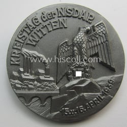 Resin-based- and/or silverish-grey-coloured, N.S.D.A.P.-related day-badge (ie. 'tinnie' or:...