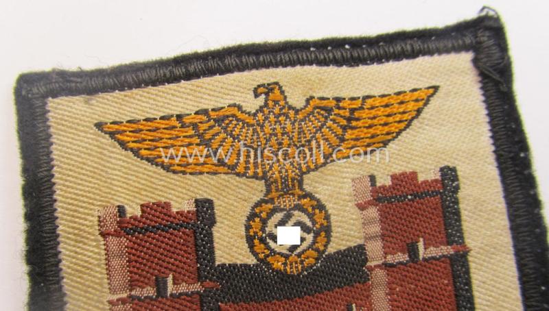 Multi-coloured N.S.D.A.P.-related arm-shield (or: armband-device) showing the coat of arms of the town of München (ie. 'Hauptstadt der Bewegung')