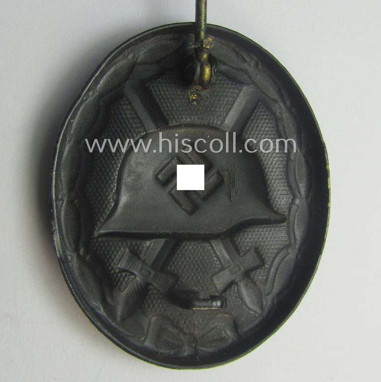 Hardly used- nor worn (ie. 'virtually mint- ie. unissued'!) example of a black-class wound-badge (or: 'Verwundeten-Abzeichen in Schwarz') being a typical non-magnetic and/or non-maker-marked example