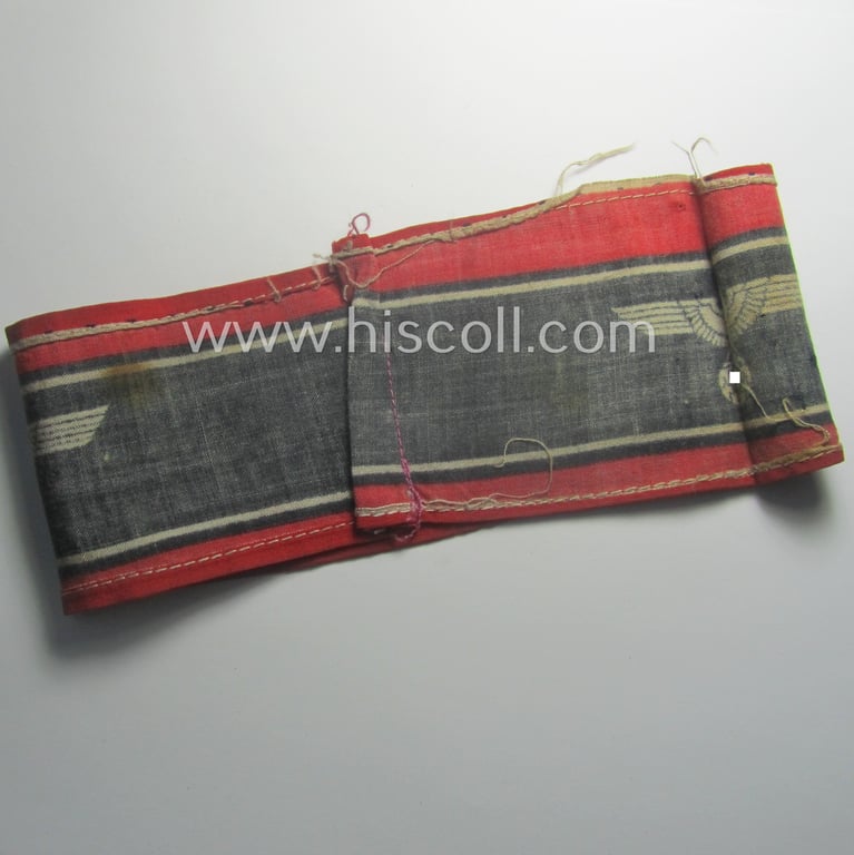 Moderately worn example of a (typically printed- and/or later-war-period) bright-red- and/or black-coloured so-called: 'Deutscher Volkssturm'-armband (ie. 'Armbinde') that comes in an overall nice condition