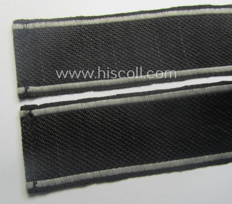 Waffen-SS, 1943/44 pattern cuff-title (ie. 'Ärmelstreifen') depicting the machine-woven Latin script text in silver-grey linnen as was intended for a member of the: 'SS-Regiment': "Westland" (ie. part of the: '5. SS-Pz-Gren.-Div. "Wiking")