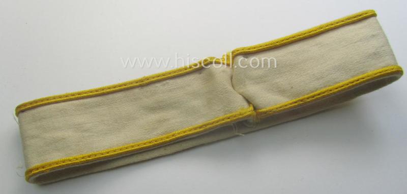 WH cuff-title (ie. 'Ärmelstreifen') entitled: 'Kreta' (being an example that bears a printed 'RbN.'-numeral and that comes in an issued-, clearly worn- and/or most certainly once tunic-attached, condition)