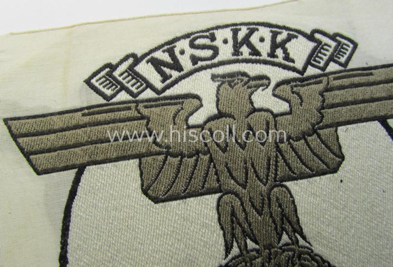Attractive - and never before seen! - truly larger-sized- and colourful so-called: N.S.K.K. (ie. 'National Socialistisches Kraftfahr Korps') (sport-shirt) eagle-device ie. patch as executed in multi-coloured 'BeVo'-weave pattern