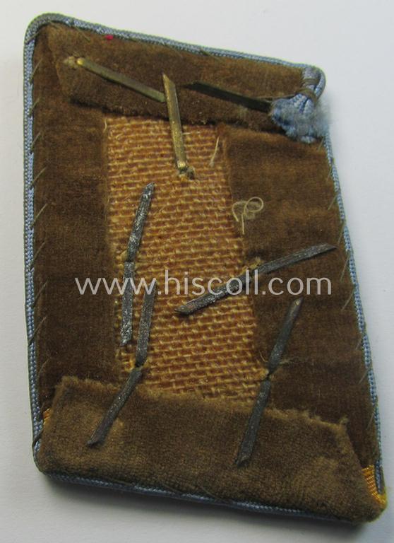 Attractive - albeit single! - N.S.D.A.P.-type collar-patch (ie. 'Kragenspiegel für pol. Leiter') being a piece as intended for usage by an: 'N.S.D.A.P.-Obergemeinschaftsleiter' at 'Orts'-level and that comes in a moderately used ie. worn-, cond...