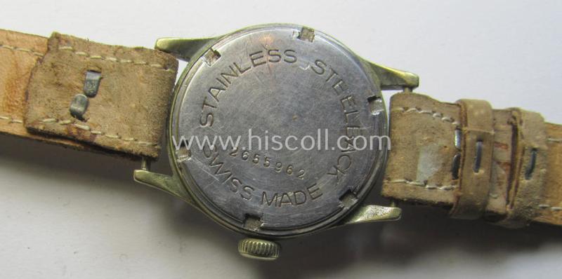 Regrettably incomplete, WH (Heeres, LW etc.) WWII-period wrist-watch (or: 'Dienstuhr') of the make: 'Moeris' having an engraved number: '2655962' on its back (and that comes in a non-functional ie. non-running condition)