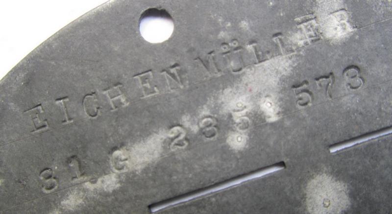 Unusually seen, zinc-based RAD- (ie. 'Reichsarbeitsdienst'-) related ID-disc (ie. 'Erkennungsmarke') bearing the stamped text ie. unit-designation: 'RAD/2/286/2 549' and that comes as recently found
