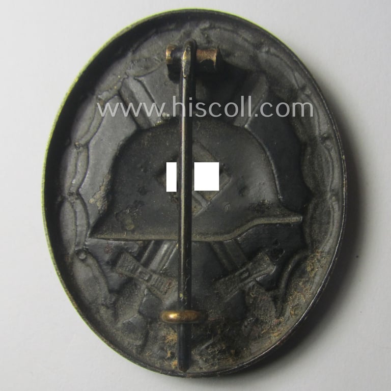 Moderately used- and/or worn, black-class wound-badge (or: 'Verwundeten-Abzeichen in Schwarz') being a typical (early!) non-magnetic and/or non-maker-marked example