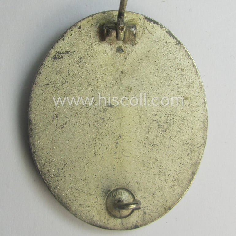 'Verwundeten-Abzeichen in Silber' (or: silver-class wound-badge) being a neatly maker- (ie. '100'-) marked example by the: 'Rudolf Wächter u. Lange'-company