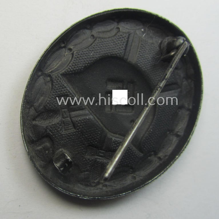 Clearly used and/or neatly maker- (ie. '88'-) marked example of a black-class wound-badge (or: 'Verwundeten-Abzeichen in Schwarz') being an example that was produced by the desirable maker (ie. 'Hersteller') named: 'Werner Redo'