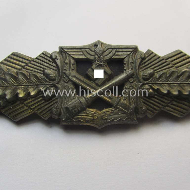 'Nahkampfspange in Bronze' (or: bronze-class close-combat clasp ie. CCC) being a maker- (ie. 'F.&B.-L.'-) marked- and/or minimally converse-shaped specimen as was produced by the maker- (ie. 'Hersteller') 'Funcke u. Brüninghaus'