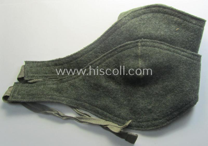 Later-war- (ie. 1943-) pattern, field-grey-coloured, WH (Heeres, Waffen-SS etc.) so-called: 'Ohrenschützer' being intended to be worn in conjunction with the 'M43'-field-caps (ie. 'Einheitsfeldmützen')