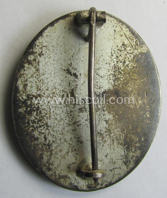 Attractive - and luxuriously-styled! - example of a: 'Verwundeten-Abzeichen in Silber' being a clearly maker- (ie. '13'-) marked, 'Buntmetall'-based example by the maker (ie. 'Hersteller') named: 'Gustav Brehmer'