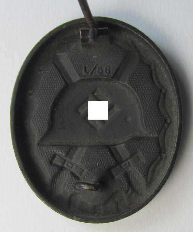 Neatly maker- (ie. 'L/56'-) marked example of a black-class wound-badge (or: 'Verwundeten-Abzeichen in Schwarz') being an example that was produced by the maker (ie. 'Hersteller') named: 'Funcke & Brüninghaus'