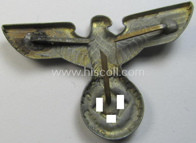 Attractive - silverish-golden-coloured- and/or: zinc- (ie. 'Feinzink'-) based (political-style) visor- (ie. 'Schirmmützen'-) cap-eagle being a detailed example that is (unusually!) void of a makers'-designation
