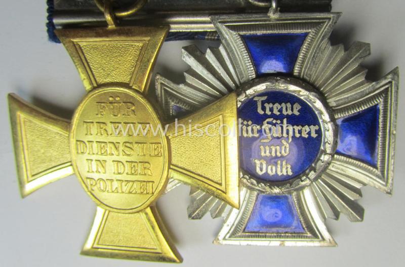 2-pieced, N.S.D.A.P.- and/or: 'Polizei'-related) medal-bar (ie. 'Spange') showing resp. a: 'N.S.D.A.P.-D.A. in Silber' (ie. '2. Stf. für 15 Jahre t.D.') and 'Pol.-Dienstauszeichnung 1. Stf.' that both come period-mounted as a: 'Doppelspang...