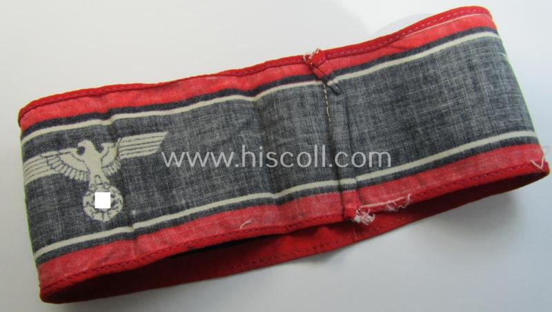 Superb, typically printed- and/or later-war-period, bright-red- and/or black-coloured so-called: 'Deutscher Volkssturm'-armband (ie. 'Armbinde') that comes in an overall very nice- (I deem hardly used- nor worn- ie. 'virtually mint'-), conditio...