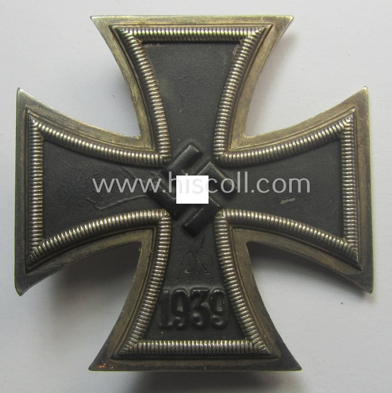 'Eisernes Kreuz 1. Klasse' (ie. Iron Cross 1st class) being an (I deem) early-war-period-produced (and neatly maker- ie. '65'-marked-) example by 'K&Q' that comes complete in its specific etui