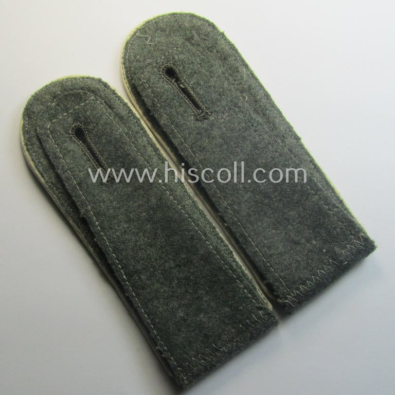Pair of WH (Heeres), early- (ie. mid-) war-period- (ie. 'M40- o. M43'-) pattern EM-type shoulderstraps as piped in the white-coloured branchcolour as was intended for a: 'Soldat eines Infanterie-Rgts.'