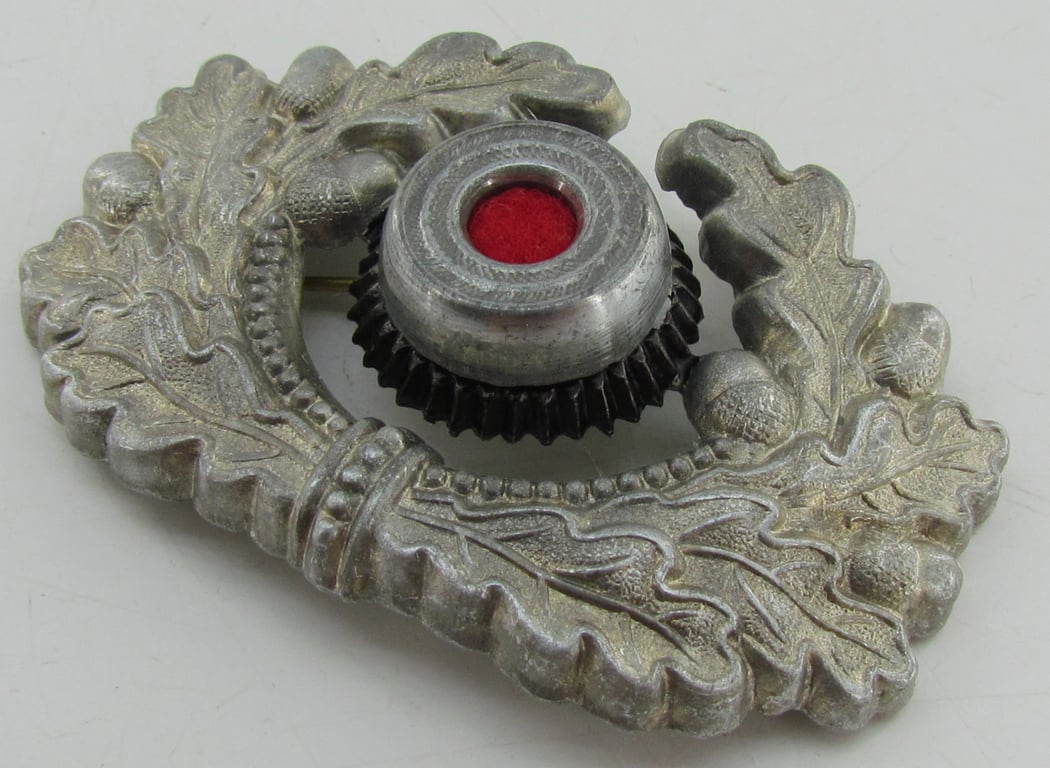 Wehrmacht (Heer) visor cap wreath and cocarde ( DRGM marked )