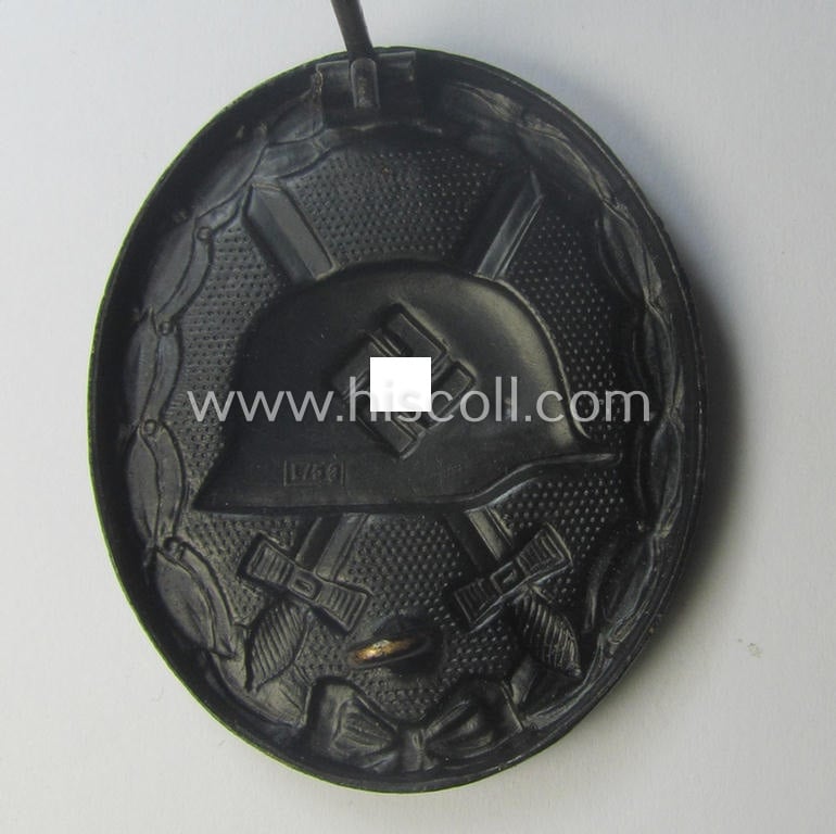 'Verwundeten-Abzeichen in Schwarz' being a maker- (ie. 'L/53'-) marked example by the company: 'Hymmen & Co.' and that came stored in its typical 'LDO'-type etui (ie. two-pieced-box)