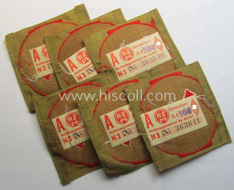 Attractive, DJ (ie. 'Deutsches Jungvolk') arm-badge as was intended for usage by a member who served within the: 'Oberbann 1' (being a 'virtually mint- ie. unissued' example that still shows its period-attached, 'RzM'-etiket)