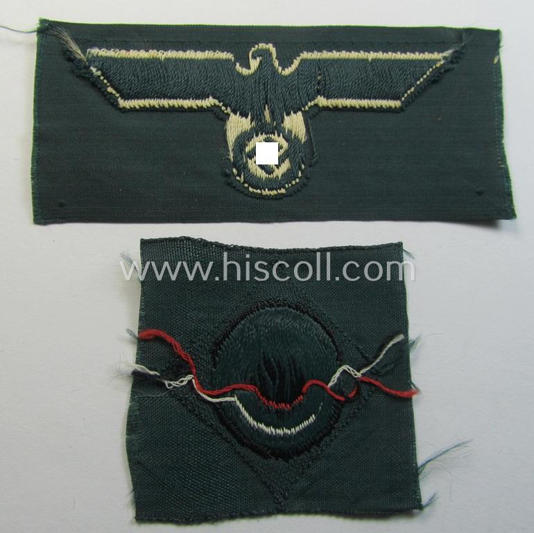Pre- (ie. early-) war-period, WH (Heeres) cap-eagle & cocarde-set (ie. 'Schiffchenmützen-Adler u. Kokarde für Mannschaften u. Uffz.') being a 'virtually mint' set as executed in bluish-grey-coloured linnen on a darker-green-coloured background