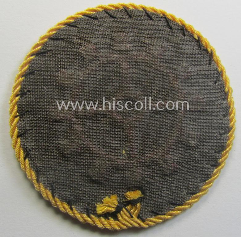 WH (Heeres ie. 'Panzer'-) trade- ie. special-career-patch having a golden-yellow-coloured 'Kordel' (ie. 'Umrandung') attached as was intended for a: 'Panzerwarte o. Kfz.-Warte o. Handwerker' (aka 'KFZ-Technisches Personal')