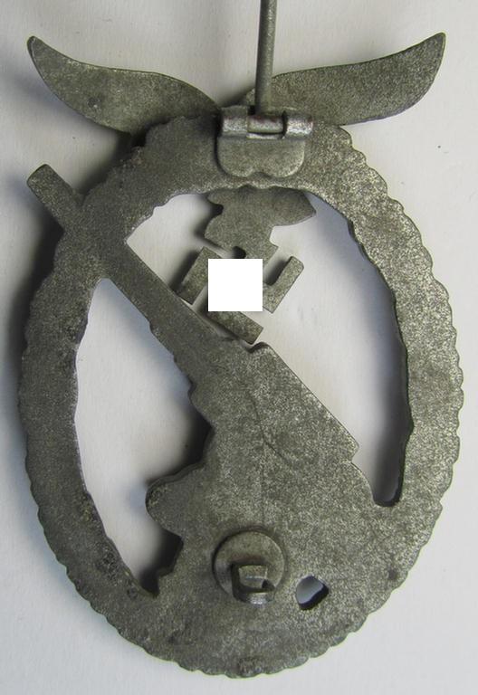 Attractive - and just moderately used! - 'Feinzink'-based example of a WH (Luftwaffe) 'Flakkampfabzeichen' (or: airforce anti-aircraft badge) being a very detailed albeit non-maker-marked example as was produced by the: 'E. Ferd. Wiedmann'-comp...