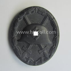 Minimally used- and/or hardly worn black-class wound-badge (or:...