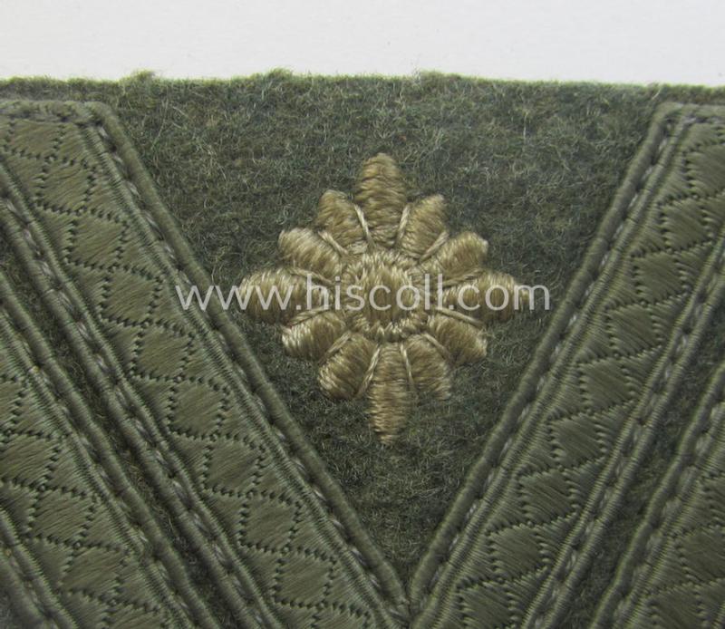 WH (Heeres) 'Armwinkel' (or: arm-chevron) as executed on typical field-grey-coloured wool as was specifically intended for usage by a soldier with the (unusually encountered!) rank of: 'Stabsgefreiter'
