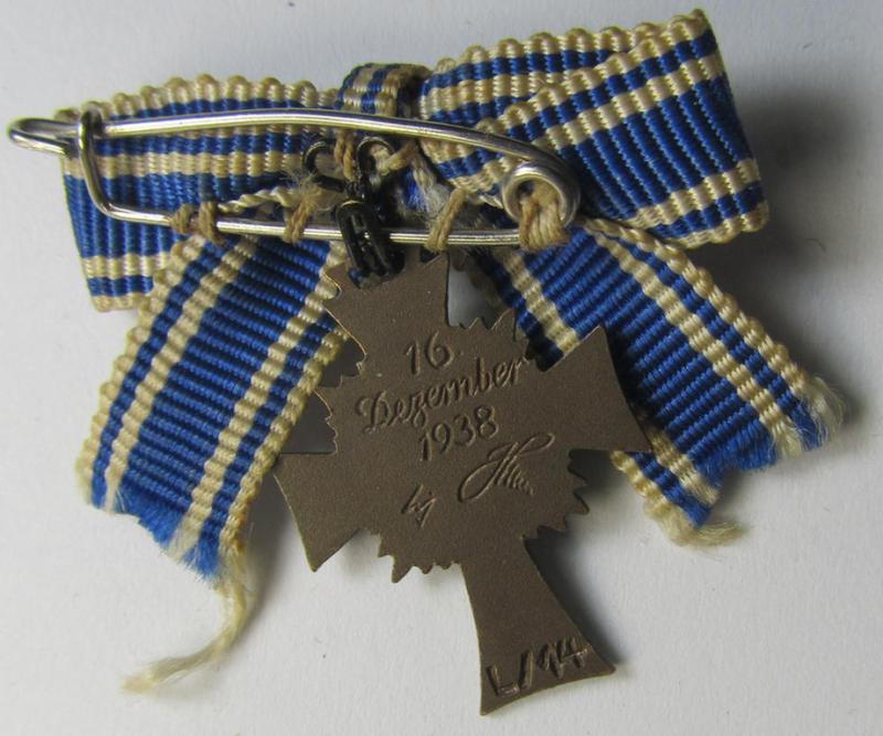 Miniature of an: 'Ehrenkreuz der deutschen Mutter - dritte Stufe' (or: bronze-class mothers'-cross) being a maker- (ie. 'L/14'-) marked example that comes in an overall nice- (albeit moderately worn- ie. used-), condition