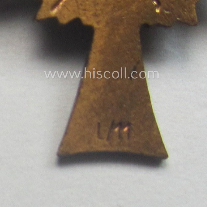 Miniature of an: 'Ehrenkreuz der deutschen Mutter - dritte Stufe' (or: bronze-class mothers'-cross) being a maker- (ie. 'L/11'-) marked example