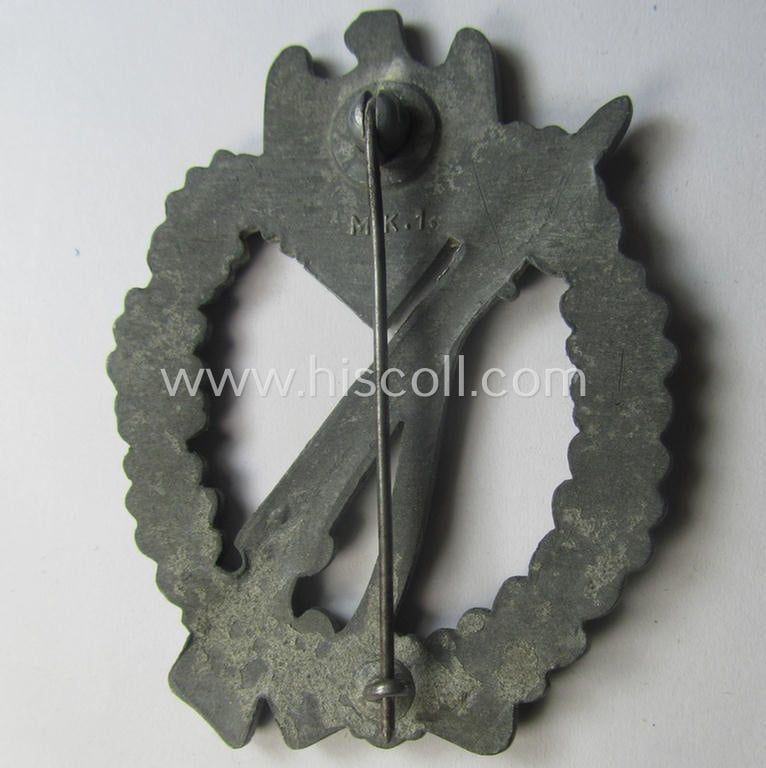 'Infanterie-Sturmabzeichen in Silber' (or: silver-class infantry-assault badge ie. IAB) being a neatly maker- (ie. 'MK 1'- or: 'Metall u. Kunststoff'-) marked example as executed in greyish-silverish-coloured 'Feinzink'