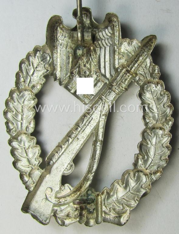 'Infanterie Sturmabzeichen in Silber' being a non-maker-marked  & 'hollow-back'-pattern example as executed in silver-toned metal (ie. 'Buntmetall' ie. Tombak) by the: 'Wilh. Deumer'-company
